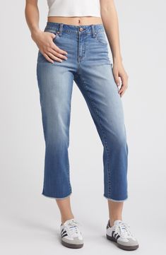 Keep it casual and cool in these faded mid-rise jeans styled with cropped, straight legs and fraying hems. 26" inseam; 15" leg opening; 9 1/2" front rise; 14 1/2" back rise Zip fly with button closure Five-pocket style 56% cotton, 24% rayon, 19% polyester, 1% spandex Machine wash, tumble dry Imported Medium Wash Straight Bottoms With Frayed Hem, Casual Medium Wash Cropped Flare Jeans, Straight Bottoms With Frayed Hem In Medium Wash, Straight Bottoms With Medium Wash And Frayed Hem, Dark Wash Mid-rise Cropped Jeans With Frayed Hem, Straight Fit Bottoms With Frayed Hem In Medium Wash, Washed Blue Relaxed Fit Mid-rise Cropped Jeans, Spring Denim Blue Straight Cropped Jeans, Spring Denim Blue Cropped Straight Jeans