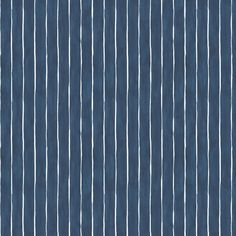 a blue and white striped wallpaper with vertical lines