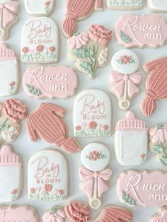 baby shower cookies decorated with pink and white icing