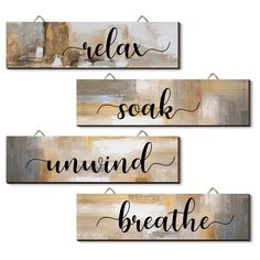 three wooden signs that say relax, soak, unwind and breathe