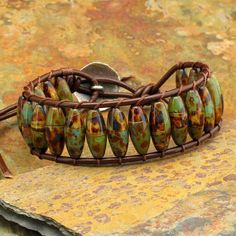 must try with paper beads! Stem Fashion, Leather Beads, Make Paper Beads, Paper Bead Jewelry, Large Beads, Beaded Wrap Bracelets, Wrap Bracelets, Paper Jewelry