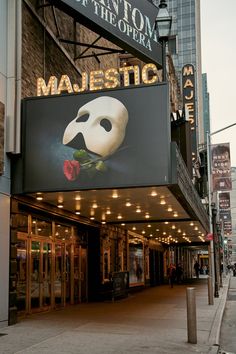 the marquee for the theatre majestic is lit up