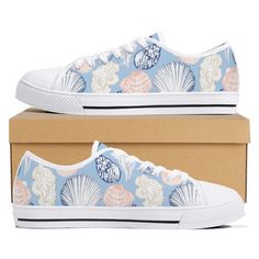 Welcome to our Store! Your business is always appreciated! ♥ These ocean blue, low top canvas sneakers with a silhouette seashell print are perfect for the beach vacation or cruise vacation enthusiast. The matching printed tongue adds a stylish touch, making these shoes ideal for anyone who loves the water. Comfortable and trendy, they appeal to beach lovers, cruise goers, and seaside fashionistas looking to showcase their love for the ocean. Whether strolling along the boardwalk or exploring co Beach Sneakers With Textured Sole And Lace-up Design, Sea Shells Shoes, Non-slip Beach Sneakers, Beach Sneakers For Summer, Synthetic Material, Ocean Heels, Seashells Patterns, Seashell Print, Nautical Outfits, Beach Lover Gifts