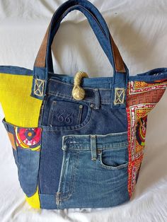 a handbag made out of jeans and fabric