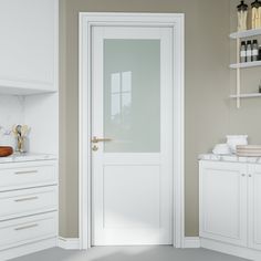 a white door in a kitchen next to some cupboards and shelves on the wall