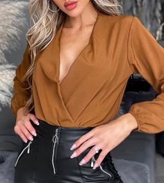 Stylish party wear bodysuit Front wrap with low cut neckline Long sleeves with elasticated cuffed hem Approx length: Side Seam: 22"(56cm)95% Polyester 5% ElastaneModel is 5'4 and wears one size (8/12) Wrap Bodysuit, Stylish Party, Womens Bodysuit, Catsuit, Low Cut, Party Wear, Favorite Outfit, Bathing Beauties, Long Sleeve Blouse