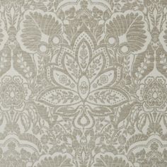 an old wallpaper pattern in grey and white