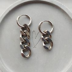 Trendy chunky curb chain/Cuban link huggie hoop earrings in silver! Unisex. Made of high quality stainless steel so are hypoallergenic and won't tarnish or discolour.  Hoops measure  16mm Width of chain: 14mm Various options available (see photographs) Please don't hesitate to contact me with any queries or suggestions 😊  Comes gift wrapped 💝 Trendy Streetwear Silver Chain Jewelry, Chunky Metal Hoop Earrings As A Gift, Minimalist Silver Cartilage Earrings With Chain, Tarnish Resistant Silver Chain Link Earrings, Everyday Chain Dangle Hoop Earrings, Silver Chain Hoop Earrings As Gift, Silver Link Earrings For Everyday, Trendy Silver Chain Link Earrings, Trendy Chain Link Earrings For Everyday