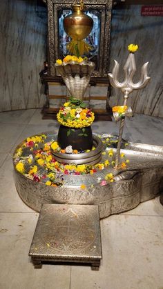 an elaborately decorated altar with flowers and candles