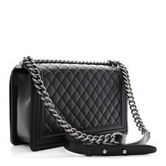 This is an authentic CHANEL Calfskin Quilted New Medium Boy Flap in Black. This stylish shoulder bag is crafted of luxuriously soft diamond quilted calfskin leather with linear quilted borders in black. The bag features a ruthenium chain link shoulder strap with a leather shoulder pad and a ruthenium Chanel boy CC push lock. This opens the full flap to a black fabric interior with zipper and flat pockets. Chanel Boy Bag Black, Cc Card, Chanel Crossbody, Chanel Tweed, Chanel Shoulder Bag, Heart Bag, Stylish Shoulder Bag, Chanel Caviar, Chanel Boy