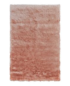 an orange rug on a white background