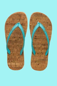 Original Cork uses cork from their homeland of Portugal to create these patented 100% natural vegan flip flops. These sandals are made from cork straps that come in a variety of colors, a cork footbed, and a rubber cork sole. The sandals break in as you wear them and become increasingly flexible and molded to your feet. Perfect for wearing indoors or outdoors! ​Characteristics: Minimalist style offers an eco-centric look for outdoor wear during the warmer seasons and indoor wear during fall and Flat Sandals With Cork-bed Midsoles For Beach, Strappy Beach Footbed Sandals With Cork-bed Midsoles, Beach Slip-on Cork Sandals, Blue Sandals With Cork-bed Midsoles For The Beach, Beach Strappy Sandals With Cork-bed Midsoles, Cork Bracelet, Cork Necklace, Cork Wallet, Cork Bag