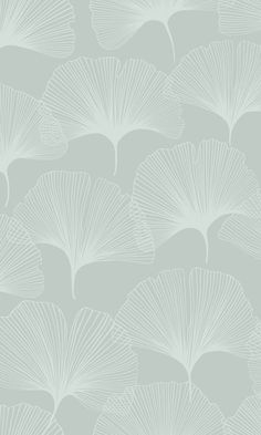 a gray and white wallpaper with large fan shaped leaves on it's sides