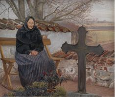 an old woman sitting on a bench next to a cross