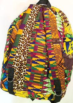 Our Esi Back Pack is made with 100% cotton by the artisan of Ghana, West Africa. The inspiration behind this back pack is the cultural name of individuals from the Akan tribe. Esi means Sunday born. In the Akan tribe babies are usually named by the day of the week that they were born. This bag is unisex and can be worn by men and woman. Bohemian Multicolor Backpack For School, Traditional Multicolor Backpack For Travel, Handmade Multicolor Standard Backpack, Handmade Multicolor School Backpack, Handmade Multicolor Backpack For School, Multicolor Backpack With Adjustable Strap For Festivals, Multicolor Cotton Backpack For Daily Use, Casual Handmade Multicolor Backpack, Handmade Multicolor Casual Backpack