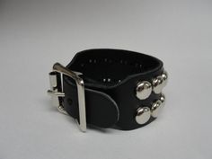 Handmade 1-1/2" - 38 mm Wide Genuine Black Leather studded Wristband with Silver/Chrome Buckle & Rou Punk Style Silver Leather Cuff Bracelet, Punk Style Silver Cuff Leather Bracelet, Punk Style Silver Leather Wristband, Silver Rivets Wristband For Concert, Adjustable Leather Bracelet With Rivets For Concerts, Adjustable Cuff Bracelet With Rivets, Silver Adjustable Leather Bracelet With Wrist Strap, Adjustable Silver Leather Bracelet With Wrist Strap, Adjustable Silver Wristband With Rivets