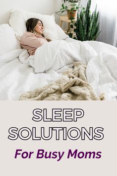 a woman laying in bed with the words sleep solutions for busy moms on it