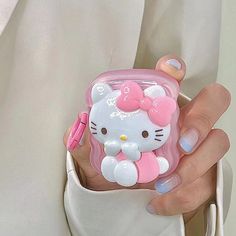 Kitty Pink Airpods Case Feminine and adorable, our Kitty Pink Airpods Case is a must-have accessory for all cat lovers. This stylish case will not only protect your Airpods, but its cute design will also add a touch of charm to your everyday look. Enjoy your music with a purr-fect companion by your side. Hello Kitty Airpods Case, Pink Airpods Case, Pink Airpods, Hello Kitty Design, Hello Kitty Pink, Pink Cases, Hello Kitty Items, Airpods Case, Airpod Case