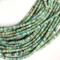 "✦Gemstone: Genuine Natural Turquoise ✦Color: Turquoise Blue / Green ✦Shape: Heishi / Disc ✦Size: 4x3mm ✦Length: 16\" inches strand ♕Beautiful & High Quality Beads♕ You will get similar Stone because of the natural stones. PLEASE NOTE: We can guarantee you that these stones are 100% natural!  If you are not satisfied with your beads, you may return them within 7 days of delivery for a refund. We ship orders every day from Monday to Saturday, aiming to ship your order on the same day or the next Green Heishi Bead Jewelry With Gemstone Beads, Green Southwestern Jewelry With Spacer Beads, Southwestern Green Jewelry With Spacer Beads, Southwestern Style Green Jewelry With Spacer Beads, Turquoise Heishi Beads Round Jewelry, Turquoise Heishi Beads Jewelry, Adjustable Turquoise Gemstone Necklace, Adjustable Green Turquoise Necklace With Spacer Beads, Hand-strung Turquoise Heishi Beads Necklace