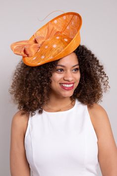 Introduce a surge of color with the Bright Prospects Fascinator! An orange sinamay cup fascinator with white polka dots will complete your Derby look. ﻿NO RETURNS/EXCHANGES due to the nature of the product (special occasions and headwear). Not all screens/lighting are created equal. Make sure you are happy with the color match before ordering! If you have any concerns, let us know! Sinamay, Headband All Sales Final on Hats and Fascinators. Colors may vary on different devices. Orange Mini Hat For Kentucky Derby Races, Orange Fascinator For Kentucky Derby Races, Orange Spring Races Fascinator, Orange Spring Fascinator For Races, Orange Fascinator For Spring Races, Spring Races Orange Fascinator, Orange Summer Fascinator For Races, Summer Orange Fitted Fascinator, Orange Mini Hats For Summer Parties