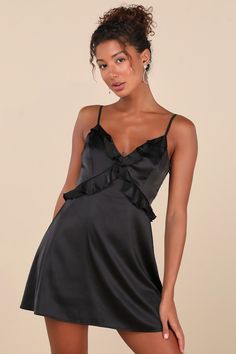 Get ready for a fun and fabulous time whenever you go out wearing the Lulus Novel Flirtation Black Satin Sleeveless Ruffled Mini Dress! Sleek woven satin shapes this too-cute dress that starts with adjustable spaghetti straps and a classic V-neckline. Trendy ruffle trim frames the princess-seamed bodice, all atop a timeless A-line skirt that ends at a chic mini hem. Hidden side zipper/clasp. Fit: This garment fits true to size. Length: Mid-thigh. Size medium measures 27" from adjustable straps t Ruffled Mini Dress, Ruffle Mini Dress, Strapless Bra, Dress 100, Large Size Dresses, Go Out, A Line Skirt, Black Satin, Ruffle Trim