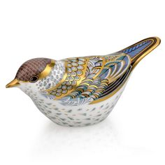 a decorative bird figurine on a white background