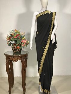 A Marvellous Embroidered Kashmiri Saree, which you can wear at any party or a wedding.- - - - - - - - - - - - - - - - - - - - Product Details- Condition: Brand New- Style: Saree Dress- Embroidery: Kashmiri Tilla Hand Embroidery- Base Colour: Black- Embroidery Colour: Golden - Care Instructions: Dry Clean OnlyF A B R I CSaree: Pure CrepeBlouse: Pure CrepeF I N I S H- UnstitchedYou can get it stitched locally.- StitchedWant your blouse ready to wear, let us know the style you want and we will stit Kashmiri Saree, Kashmiri Embroidery, Saree Women, Womens Black Coat, Traditional Outfit, Black Pure, Dress Embroidery, Bohemian Women, Black Embroidery