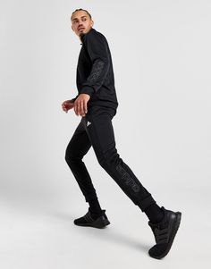 From active days to recovery days, match up your 'fit with this men's Linear Poly Tracksuit from adidas. In a Black colourway, this regular-fit set is made from smooth recycled polyester knit fabric for a comfy wear, with sweat-wicking AEROREADY tech keeping you cool. The full zip track top has a funnel neckline and ribbed trims, while the pants feature a drawcord tie on the elasticated waistband. Finished off with side pockets, adidas wordmark branding and the Sportswear logo. Machine washable. | Our model is 6'1" with a 36.5" chest and wears a size medium. Sportswear Logo, Football Calendar, Nike React Vision, 270 Nike, Comfy Wear, Football Training, Football Kits, Football Boots, Jd Sports