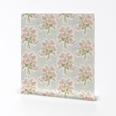 a pink and green wallpaper with flowers on it