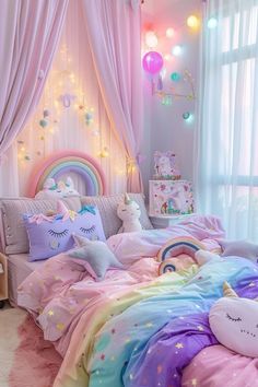 a bedroom with pink and blue walls, unicorn bedding, rainbow curtains and lights on the windowsill