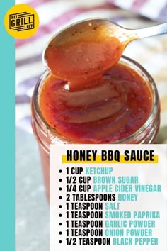 a spoon full of honey bbq sauce on top of a jar with the instructions