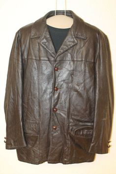 MENS BAUER VTG BROWN LEATHER INSULATED CAR COAT/JACKET SZ 40 ITEM FEATURES Brand: BAUER VINTAGE BROWN LEAHER CAR COAT/JACKET 4 BUTTONS INSULATED  Material           Outside: Leather             Liner:   NYLON/ REMOVABLE INSULATED LINER          Condition         Outside: Very Good. Minor nicks and scuffs.  (see pictures)         Liner: Very Good  (see pictures) Size: 40 (Sizes vary between brands and eras, so please use the measurements below for a better gauge of actual size.) Measurements (mea Vintage Brown Business Outerwear For Fall, Fall Business Vintage Brown Outerwear, Formal Long Sleeve Outerwear With Leather Lining, Brown Leather Lined Outerwear For Work, Brown Outerwear With Leather Lining For Work, Winter Brown Leather Sport Coat, Business Outerwear In Vintage Brown For Fall, Formal Brown Outerwear With Leather Lining, Brown Business Outerwear With Snap Buttons