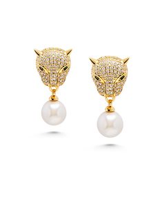 Earrings in Brass with Gold Plating Clear Cubic Zirconia Cultured Freshwater Pearls Panther Size: 15.2mm x 15mm Pearl Size: 10mm Product code: WEAR_033 Designer's Notes Introducing our Panther Earring with Pearl Drop – a captivating blend of elegance and fierce sophistication. Crafted with meticulous attention to detail, these earrings exude a bold yet graceful charm that will elevate your style to new heights. The centerpiece of this exquisite earring is a meticulously designed panther, symboli Native American Tribes, Freshwater Cultured Pearls, Pearl Size, Pearl Drop, Preston, Gold Plating, Panther, Stella Mccartney, Freshwater Pearls