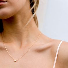 Our lovely and sweet heart necklace is the perfect reminder to show yourself some love on a daily basis. Dainty, delicate, and beautiful, this piece looks lovely layered, or worn alone. 14KT yellow, rose or white gold plated Measurements: Height: 6.5mm (.26”) Chain length: 18”+2” extender Lobster clasp closure Delicate Heart Necklace With Adjustable Chain, Dainty Gold-plated Heart Necklace For Weddings, Dainty Gold Plated Heart Necklace For Wedding, Delicate Rose Gold Heart Necklace With Clavicle Chain, Tiny Heart Pendant Charm Necklace, Delicate Heart Necklace With Delicate Chain, Dainty Rose Gold Plated Heart Necklace, Wedding Heart Necklace With Delicate Chain, Dainty Gold-plated Heart Necklace With Clavicle Chain