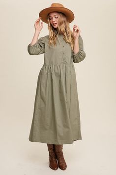 This chic maxi dress features a collared neck with a button-down front, adding a touch of sophistication to your casual look. The loose-fitted silhouette and mid puff sleeves with elastic cuffs ensure a comfortable and relaxed fit. Our Casual Clean Hem Babydoll Maxi Dress is a must-have addition to your casual wardrobe, perfect for any laid-back occasion.- Model Spec: Model is 5' 7" wearing a size small. 31-24-35 Style: Casual Print / Pattern: Plain Silhouette: Maxi Dress Fit: Loose Embellishmen Spring Casual Puff Sleeve Shirt Dress, Solid Button-up Maxi Dress For Fall, Solid Button-up Maxi Dress For Daywear, Solid Color Button-up Maxi Dress For Fall, Fall Solid Button-up Maxi Dress, Fall Solid Color Puff Sleeve Maxi Dress, Fall Solid Color Maxi Dress With Puff Sleeves, Solid Fall Maxi Dress With Puff Sleeves, Casual Puff Sleeve Maxi Dress For Fall