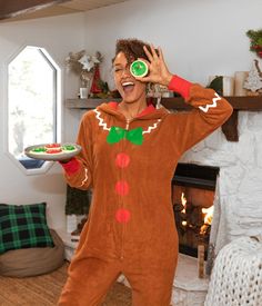 Ladies - love a sweet treat but can't bake? We hear ya. That's why we've turned our Christmas costumes into your favorite festive desserts. Bonus points - your pants still fit and you get to keep your teeth! This Women's Gingerbread Man (or woman, it's all good) jumpsuit will make the perfect addition to any Christmas scene. It's not often you can rock up to the office in what is basically pajama wear, so embrace it. The jumpsuit features a hood to fight off any blizzards, and a candy motif for Candy Buttons, Men Jumpsuit, Tube Jumpsuit, Tipsy Elves, Green One Piece, Festive Desserts, Christmas Onesie, Pajamas For Women, Christmas Rock