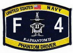 the navy's f4 phantom driver patch is shown in black and yellow with white lettering