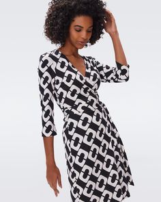 Chic Fitted Wrap Dress With 3/4 Sleeve, 3/4 Sleeve Wrap Dress For Work, Fitted Wrap Dress With 3/4 Sleeves, Fitted Wrap Dress With 3/4 Sleeves For Summer, Fitted Summer Wrap Dress With 3/4 Sleeves, Wrap Dress Dvf, Jersey Wrap Dress, Midi Wrap Dress, Wrap Dress Floral