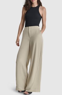 Effortlessly elevate your on-the-clock style with these streamlined wide-leg pants. Zip fly with hook-and-bar closure Front slant pockets 100% polyester Dry clean or machine wash, tumble dry Imported Versatile Wide Leg Business Casual Pants, Versatile Business Casual Wide Leg Pants, Versatile Wide Leg Pants For Business Casual, Modern Solid Color Wide Leg Ankle-length Pants, Modern Wide-leg Dress Pants With Pockets, Business Casual Wide Leg Dress Pants With 4-way Stretch, Business Casual 4-way Stretch Wide Leg Dress Pants, Modern Ankle-length Wide Leg Pants, Sleek Wide Leg Spring Pants