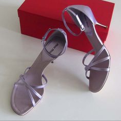 Glicine Or Lavender Metallic Leather/Fabric Miu Miu Sandals ( Style - 5x 1949 ) With Crossover Straps At Top, Tonal Stitching, Open-Toe And Buckle Closure At Ankle Strap. Metallic/Leather Architectural Heel Is About 3" High. Size: 39 1/2 ( Miu Miu ) Or 9 1/2 ( Us ). Made In Italy. Condition: New With Box ( Never Worn ). Note: Minimal Marks At Upper. Elegant Purple Sandals With Branded Heel, Miu Miu Open Toe Sandals For Summer, Miu Miu Low Heel With Strap, Miu Miu Summer Sandals, Miu Miu Open Heel Summer Heels, Miu Miu Low Heels With Heel Strap, Miu Miu Low Heel Shoes With Heel Strap, Chic Miu Miu Open Toe Sandals, Miu Miu Open Heel Heels For Summer