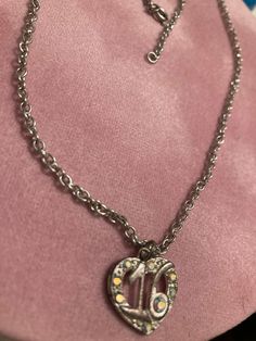 "Sterling sweet 16 cut out charm pendant on a non-Sterling  Pink glass sequins surround 16 cut out.  Sturdy- well made.  Chain. Ready to wear. Vintage  some Tarnish will be present.  MEASURES: 3/4\" ht x 3/4\" w NOTE: DO NOT GET WET, remove before showering, etc.  Email any questions prior to purchase. No returns refunds or exchanges. Pandora had a similar heart charm. This has a lot of credentials: stamped Th 926 SU will be polished before mailing." Vintage Sweet 16, Charm Pendant Necklace, Pink Glass, Sweet 16, Heart Charm, Charm Pendant, Charms, Necklace Etsy, Jewelry Necklace Pendant