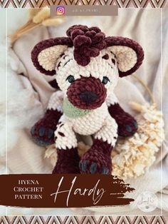 a crochet pattern for a stuffed animal that looks like a baby cow with a flower on its head