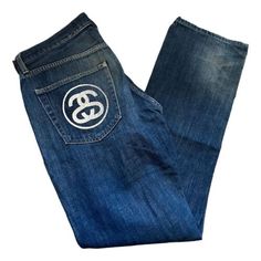 ad eBay - Find many great new & used options and get the best deals for Stussy SS logo denim jeans at the best online prices at eBay! Free shipping for many products! Casual Denim Bottoms With Logo Print, Casual Straight Leg Jeans With Logo Print, Designer Straight Leg Denim Blue Jeans, Straight Leg Cotton Jeans With Logo Patch, Logo Cotton Pants For Streetwear, Casual Denim Bottoms With Logo Patch, Designer Straight Leg Jeans For Streetwear, Casual Bottoms With Straight Leg And Logo Patch, Casual Straight Leg Bottoms With Logo Patch