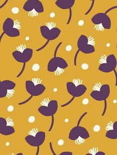 purple and white flowers on an orange background with polka dot circles in the center, as well as dots