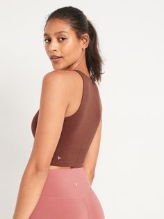 Be poised with every pose in our PowerChill yoga sports bra tank, the perfect balance between om and OMG-softness Crew neck.  Sleeveless arm openings.  Built-in shelf bra, with soft, removable cups for shaping & secure coverage.  Interior front mesh Sports Tops With Built-in Cups And Stretch, Sporty Workout Tops With Built-in Cups, Brown Sleeveless Sports Top, Athleisure Tops With Built-in Cups For Workout, Sporty Gym Tops With Built-in Cups, Sporty Yoga Tops With Built-in Cups, Sporty Solid Tops With Built-in Padding, Stretch Brown Sports Tops, Brown Stretch Sports Tops