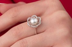 Our art deco pearl ring is 14k solid white gold. Its flower leaves are decorated with zircon stones that look fascinating. The big pearl is settled in the middle of the flower. When you think of this big pearl ring as a gift for your loved ones, it will be a great gift choice. Our gold pearl ring makes happy your loved ones on their birthdays, graduations, anniversaries, mother's day, valentine's day, or women's day. 🎁 If you want, you can add a gift note for your loved ones. It arrives in a sp Art Deco Pearl Ring, Pearl Rings In Gold For Women, Pearl Ring Designs Silver, Pearl Ring Designs Unique, Pearl Rings In Gold, Pearl Ring Designs, Big Pearl Ring, Pearl Ring Design, Vintage Pearl Ring