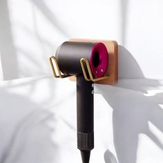 Elevate your bathroom or vanity space with this elegant wooden hair dryer holder, designed to combine functionality and style. Available in two premium wood options--yellow beechwood for a warm, natural look, or brown oak for a sophisticated, darker finish--this holder is crafted to complement any interior. Measuring 12x8cm, it's compact yet sturdy enough to securely hold various hair dryer models. Its minimalist design allows for effortless organization, helping you keep countertops clutter-fre Vanity Space, Hair Dryer Storage, Hair Dryer Holder, Natural Wood Finish, Wall Installation, Easy Wall, Compact Design, Hair Dryer, Minimalist Design