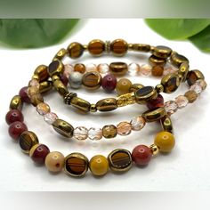 Stretch Bracelet, Natural Mookite Stone 8mm Beads, Gold Edge Electroplated Topaz Glass Oval Beads 7x4mm, & Crystal Beads 6mm Bracelet - Gold Plated Findings - This Listing Is For One Bracelet Only ( Please Message Me To Let Me Know Which Ones You Like) Brown Crystal Bracelet With Faceted Round Beads, Adjustable Brown Czech Glass Beaded Bracelet, Earthy Bracelets With Spacer And Round Beads, Earthy Bracelets With Spacer Beads, Brown Crystal Bracelet With Gemstone Beads, Brown Crystal Bracelet With Colorful Round Beads, Spiritual Brown Beaded Bracelets With Faceted Beads, Gold Earthy Beaded Bracelets With Round Beads, Adjustable Amber Beaded Bracelets With Faceted Beads