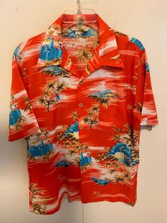 Vintage Made in California Hawaiian Shirt Surfing Aloha Shirt size Large Nice! item in very good condition for its age please see pictures for condition length 30 armpit to armpit 22 arm length 10 Red Collared Hawaiian Shirt For Beach, Collared Hawaiian Shirt With Graphic Print For Vacation, Red Collared Hawaiian Top, Red Hawaiian Shirt Short Sleeve For Beach Season, Red Tropical Hawaiian Shirt For Beach Season, Red Tropical Print Short Sleeve Hawaiian Shirt, Red Summer Hawaiian Shirt For Vacation, Red Tropical Camp Shirt For Vacation, Orange Printed Casual Hawaiian Shirt