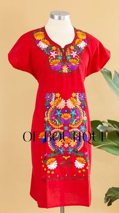 Women's Knee-Length Kimono Mexican Dress - Red- Beautiful embroidery- Fiesta attire- Poly/Cotton BlendMeasurements:Small: Bust: 34-36" -- Length: 35"Medium: Bust: 36-38" -- Length: 37"Large: Bust: 40-42" -- Length: 38"X-Large: Bust: 44-46" -- Length: 39"XXL: Bust: 47-48" -- Length: 39"3XL: Bust: 50-52" -- Length: 39"4XL: Bust: 54-56" -- Length: 39"5XL: Bust: 59-60" -- Length: 39"***NOTE:  Due to the handmade nature of these dresses, the embroidery may vary from dress to dress since each is indiv Red Folk Style Embroidered Dress, Red Folk Style V-neck Dress, Traditional Red Embroidered Spring Dress, Red Embroidered Tunic Dress, Traditional Red Embroidered Dress For Spring, Red Floral Embroidered Cotton Dress, Red Folk Embroidered Dress With Floral Design, Red Folk Style Dress With Embroidered Hem, Red Cotton Dress With Floral Embroidery